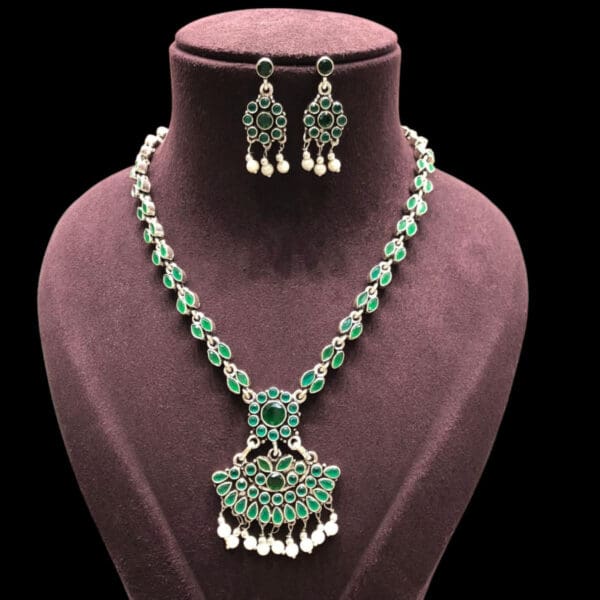 Vasundhara Silver Green Kundan Necklace Set