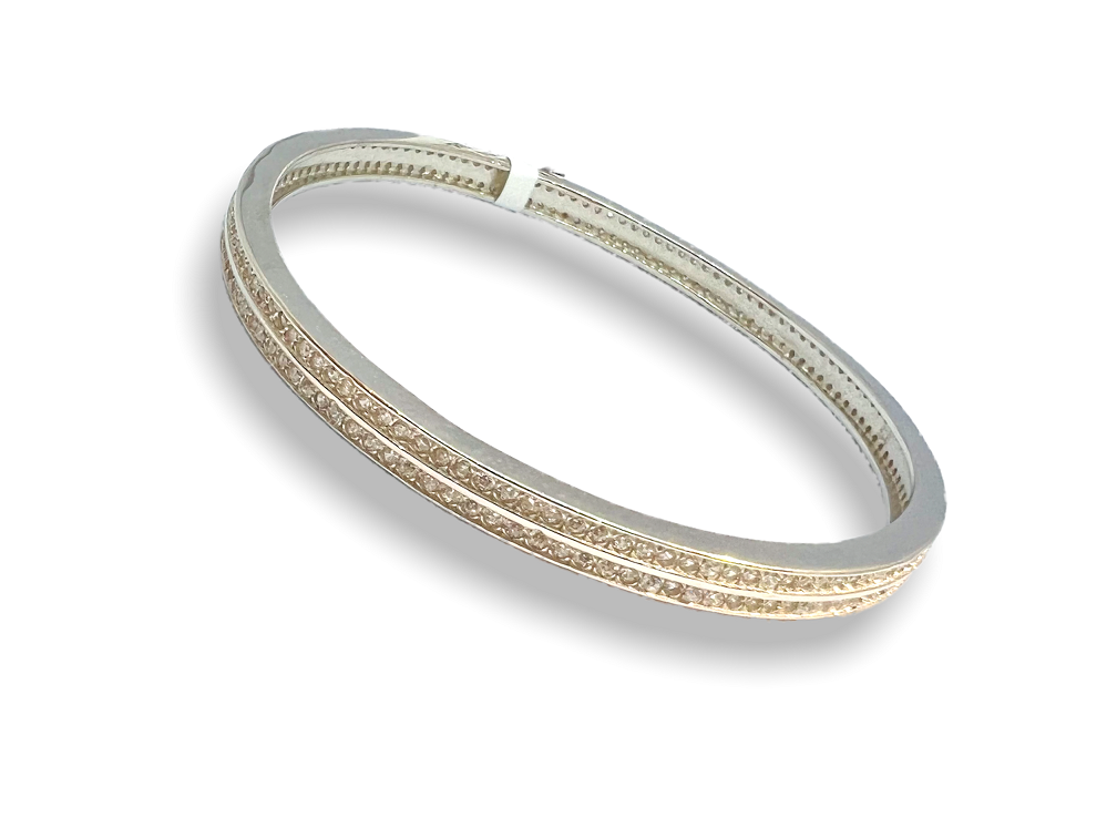 A 12.40 CARAT DIAMOND LINE BRACELET in 18ct white gold, … | Drouot.com