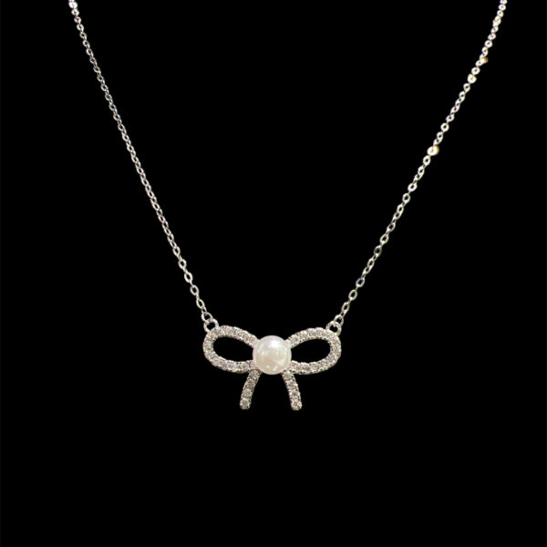 Zirconia Knot With Pearl Studded Necklace
